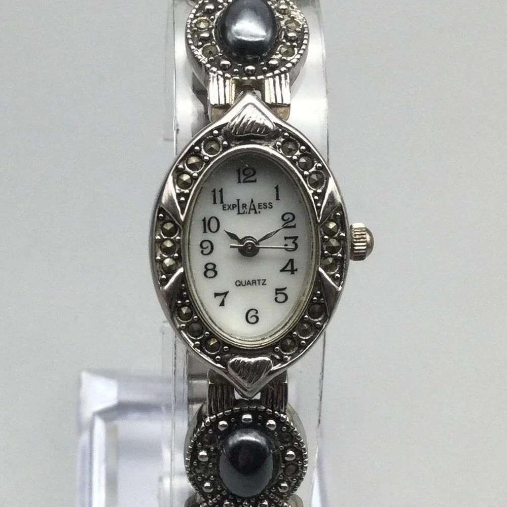 LA Express Womens Watch 18mm MOP Dial Silver Tone Marcasite Stretch New Battery